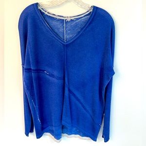 Planet Blue thin sweater with the dyed white accents. Medium/Large.